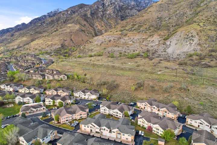 Aerial view of residential area featuring a mountain backdrop