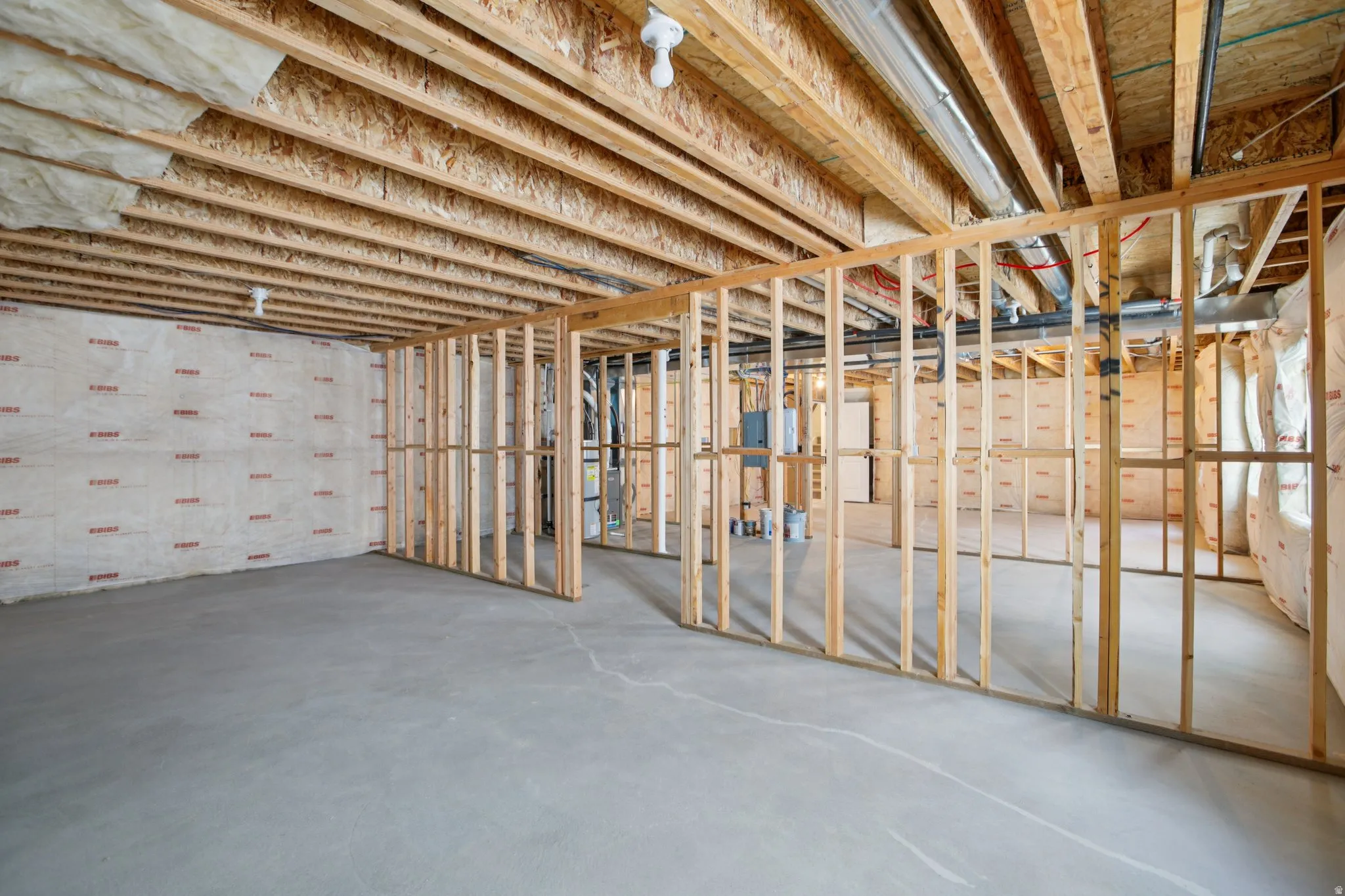 Unfinished below grade area with heating unit