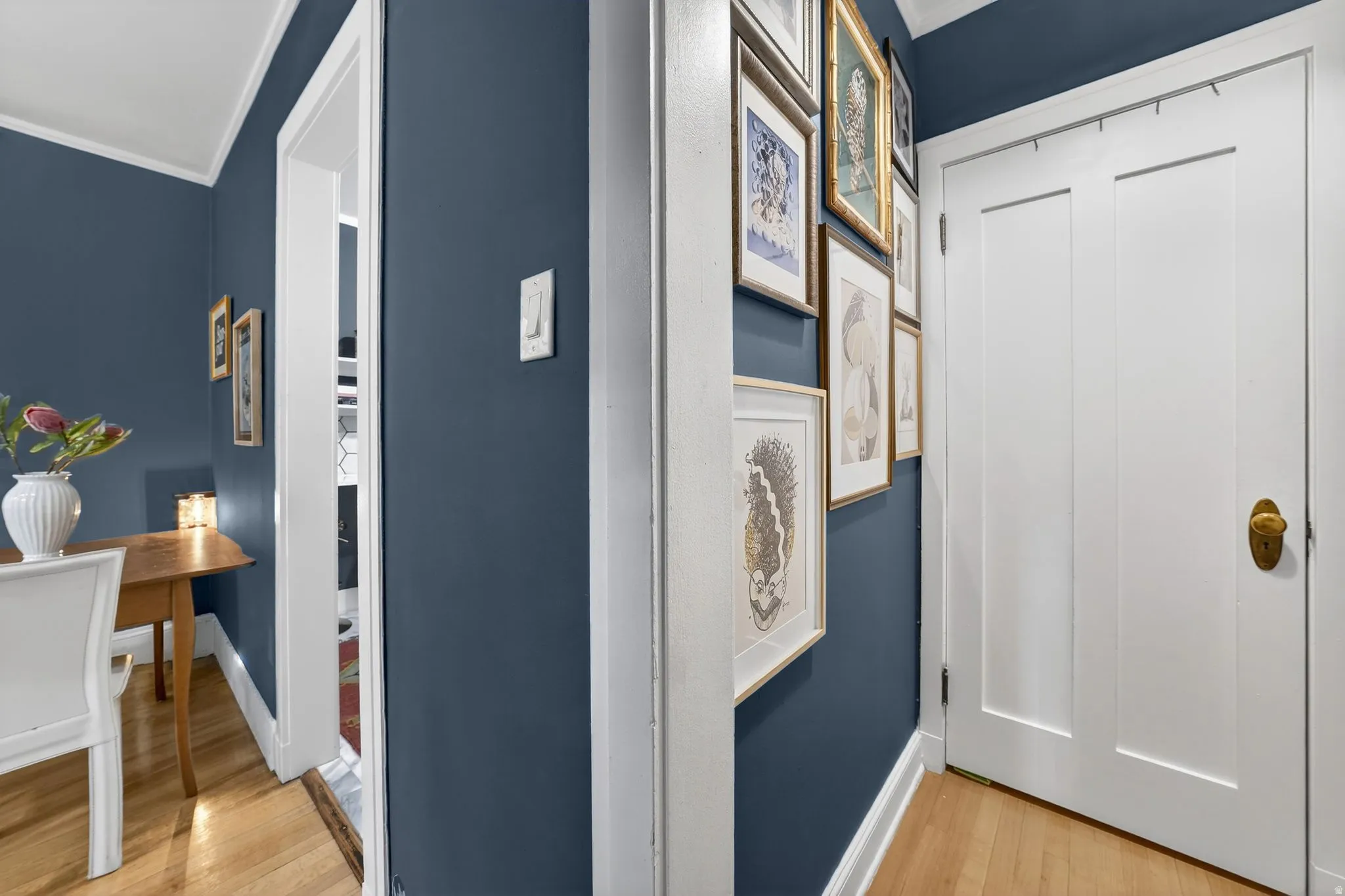 Detailed view of ornamental molding and wood finished floors