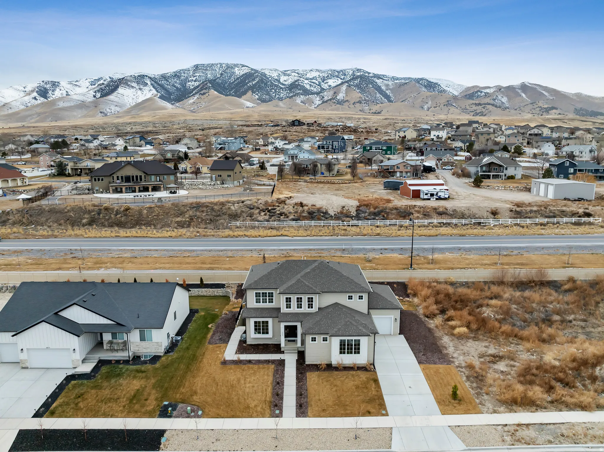 Aerial perspective of suburban area featuring mountains