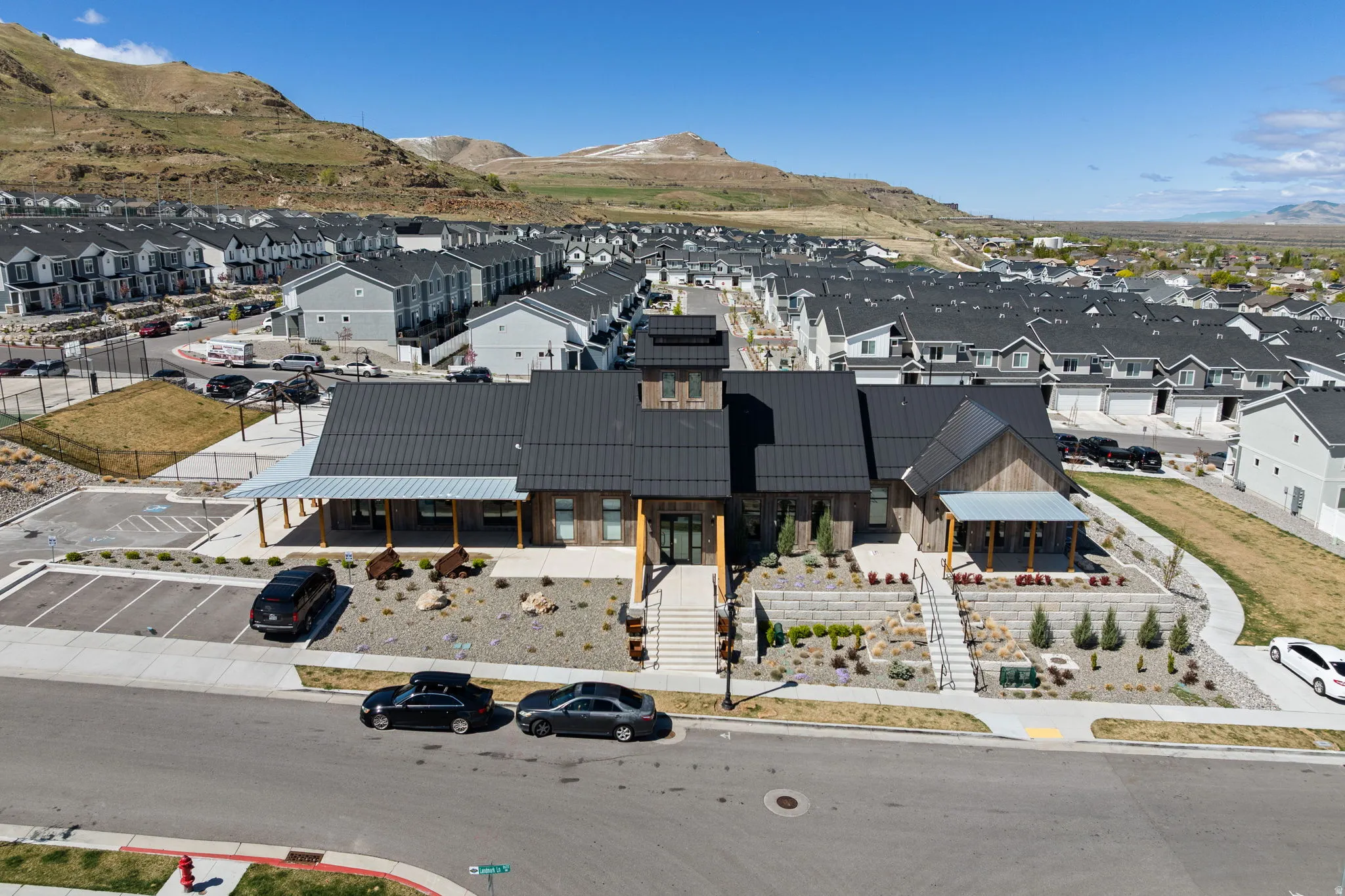 Aerial view of residential area featuring clubhouse