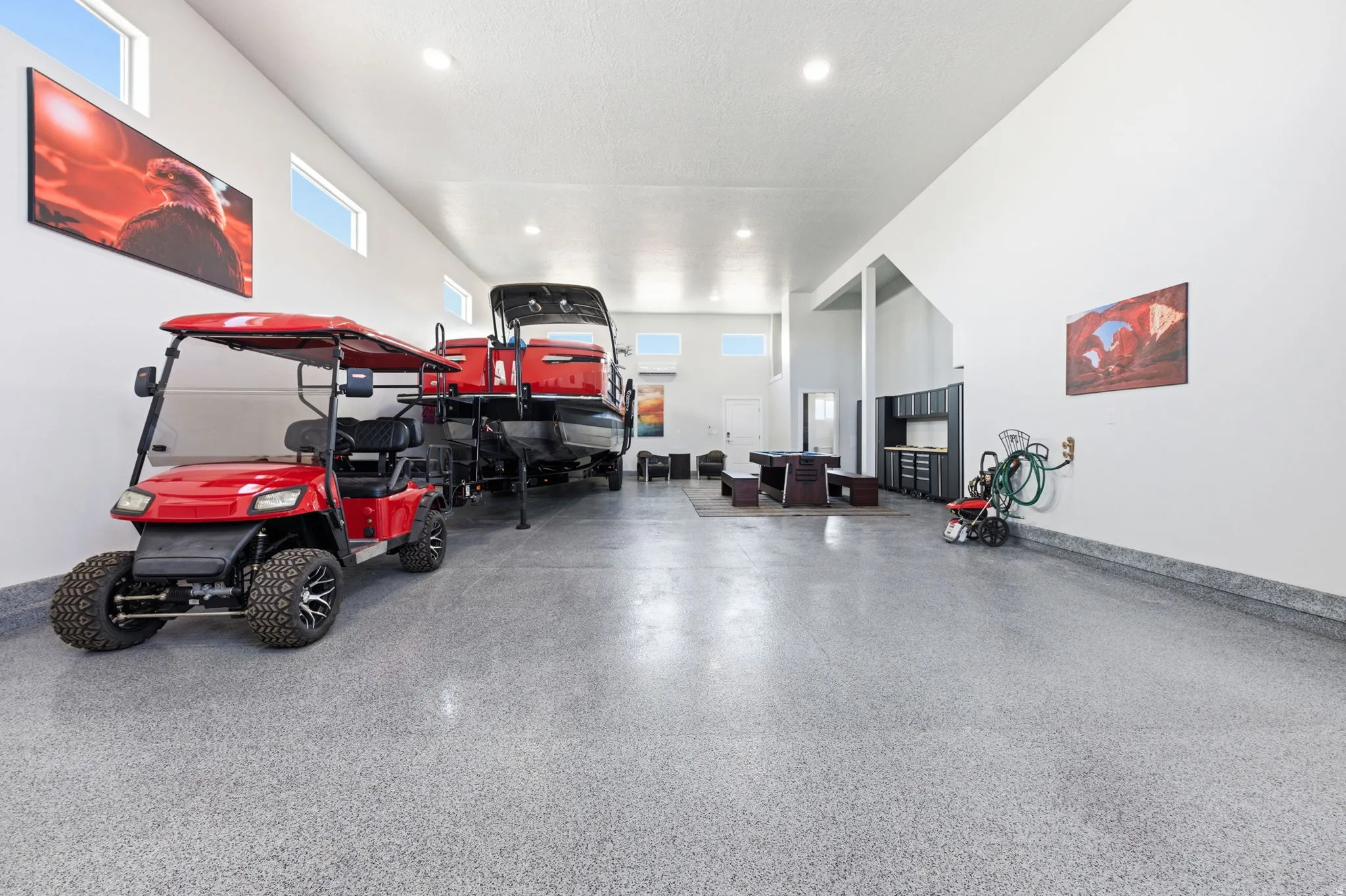 Garage featuring baseboards