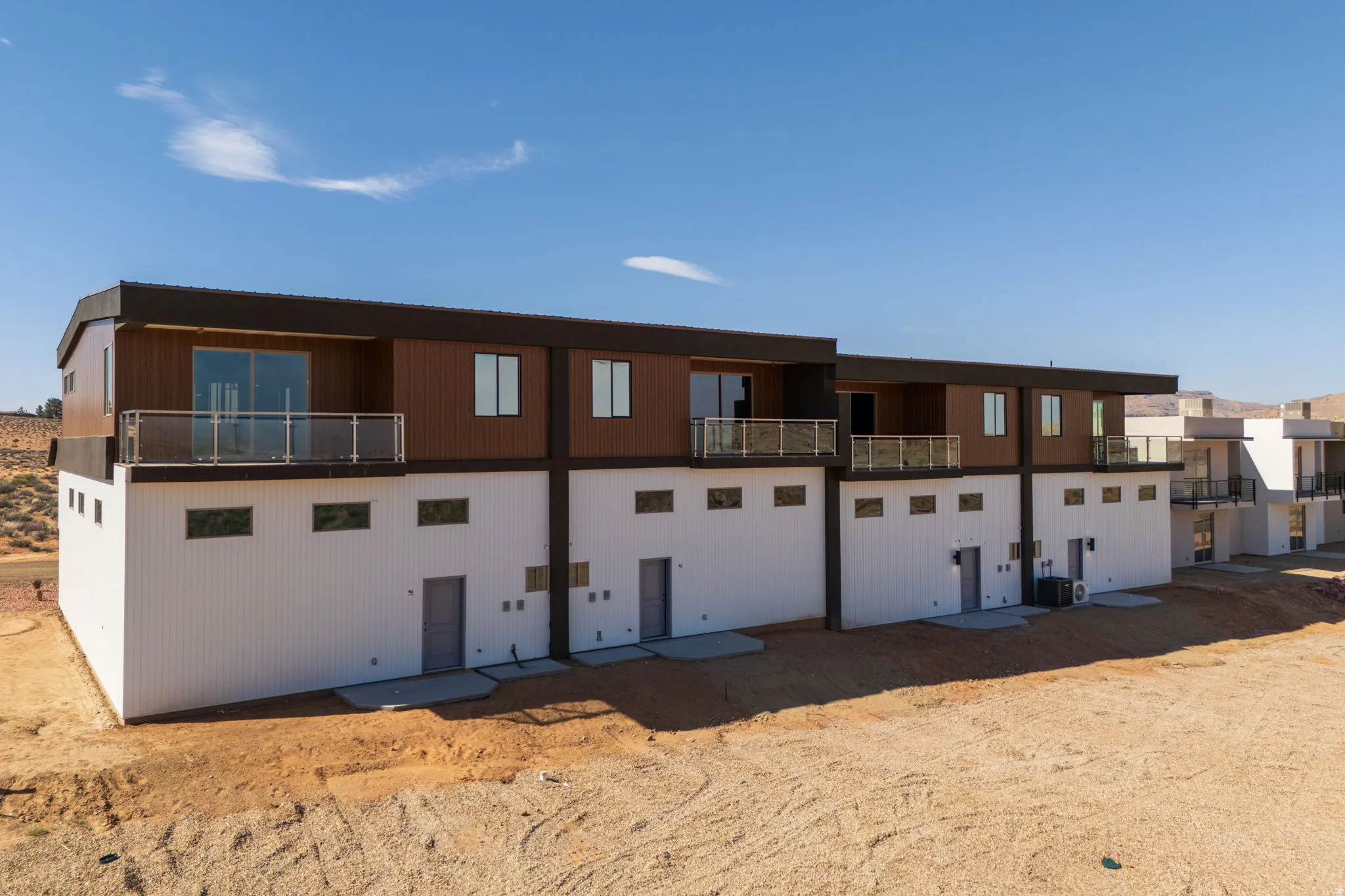Back of house featuring a balcony