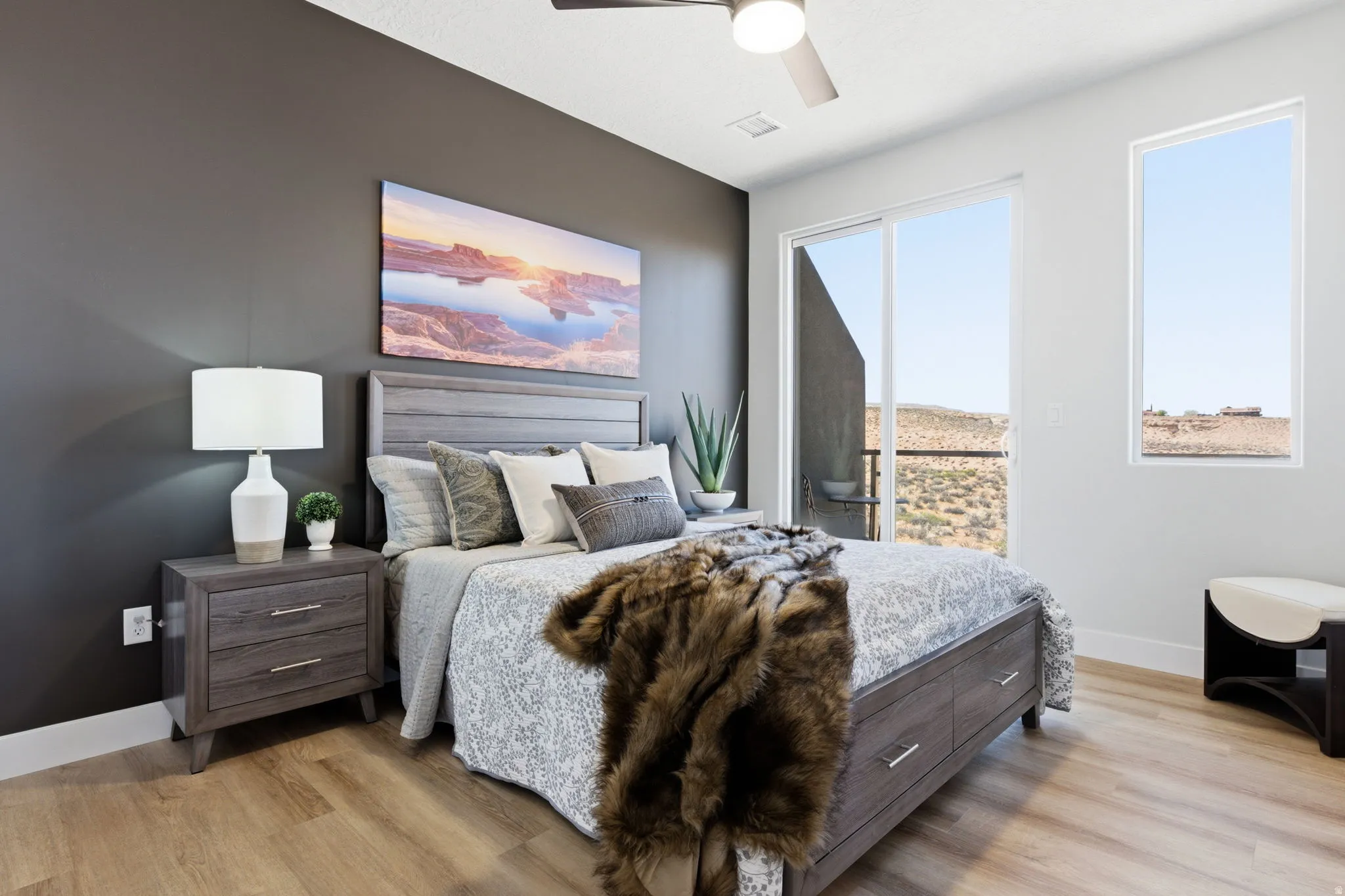 Bedroom with light wood-type flooring and ceiling fan