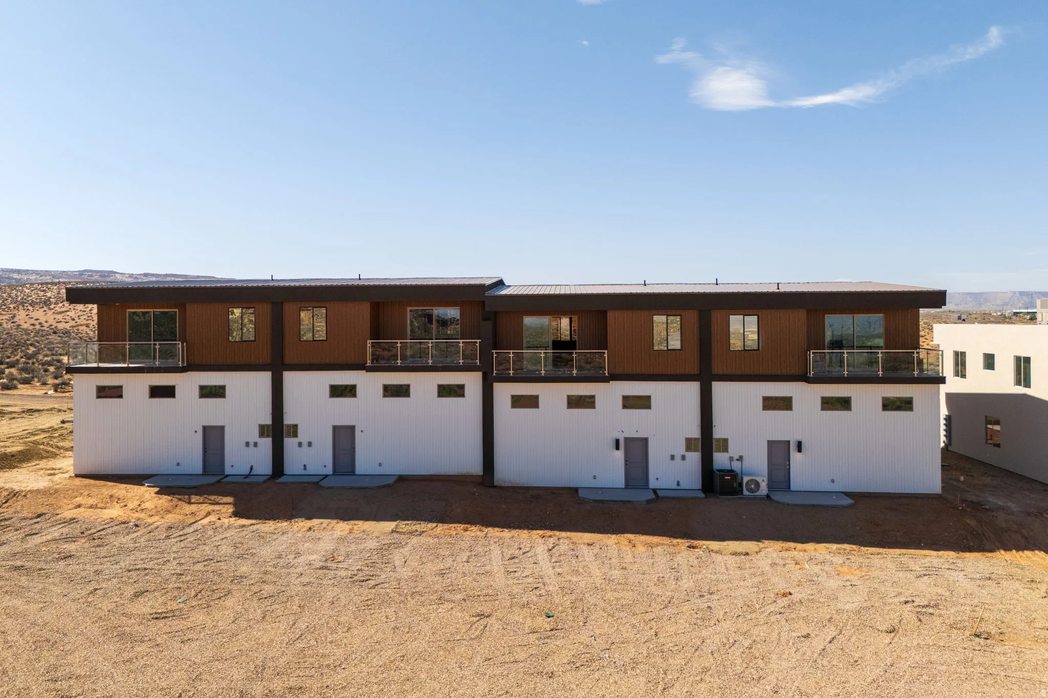 Rear view of property featuring a balcony