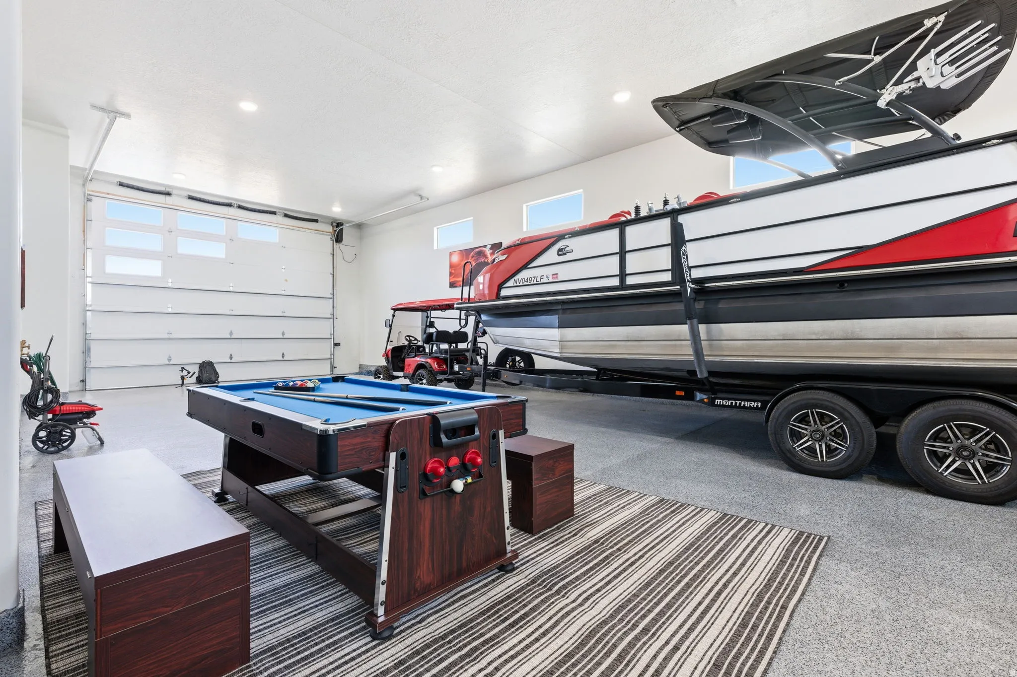 Garage featuring recessed lighting