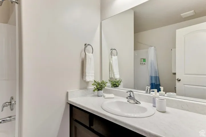 Full bathroom with vanity