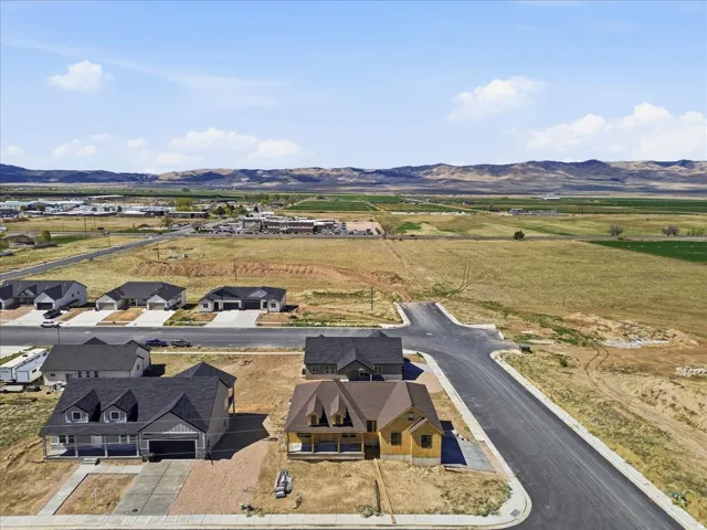Aerial view of residential area with a mountain backdrop