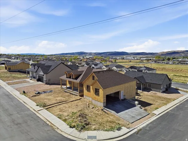 Aerial view of residential area with a mountain backdrop