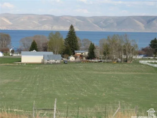View of mountain backdrop with a nearby body of water