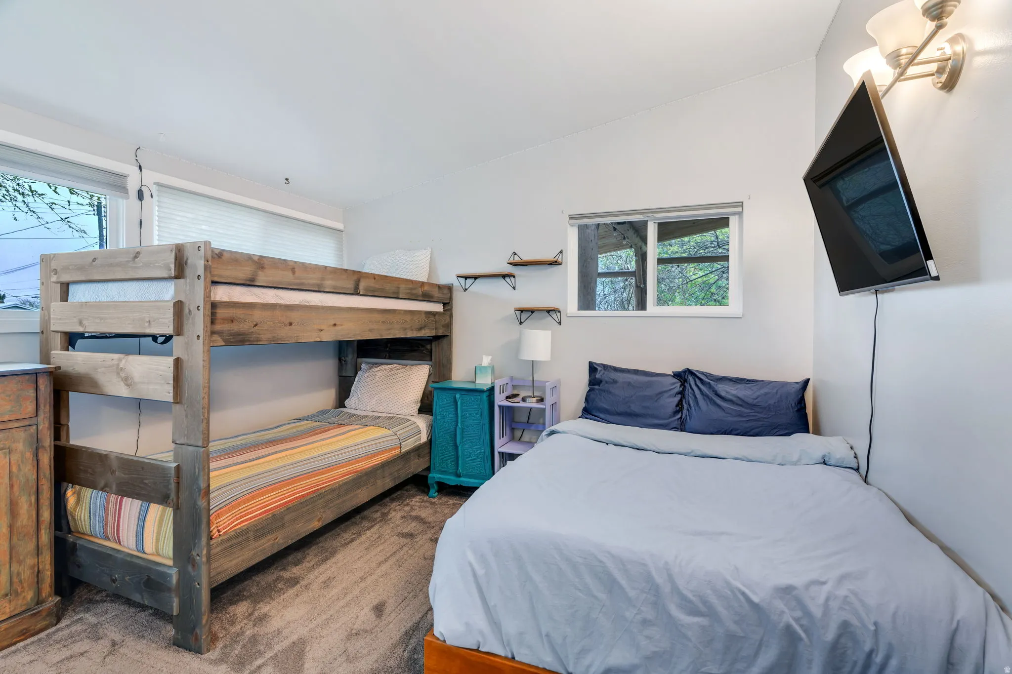 Bedroom with lofted ceiling