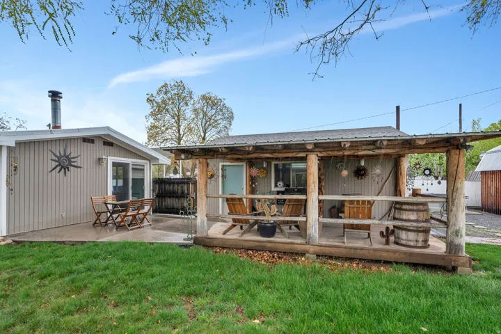 Rear view of property featuring a deck