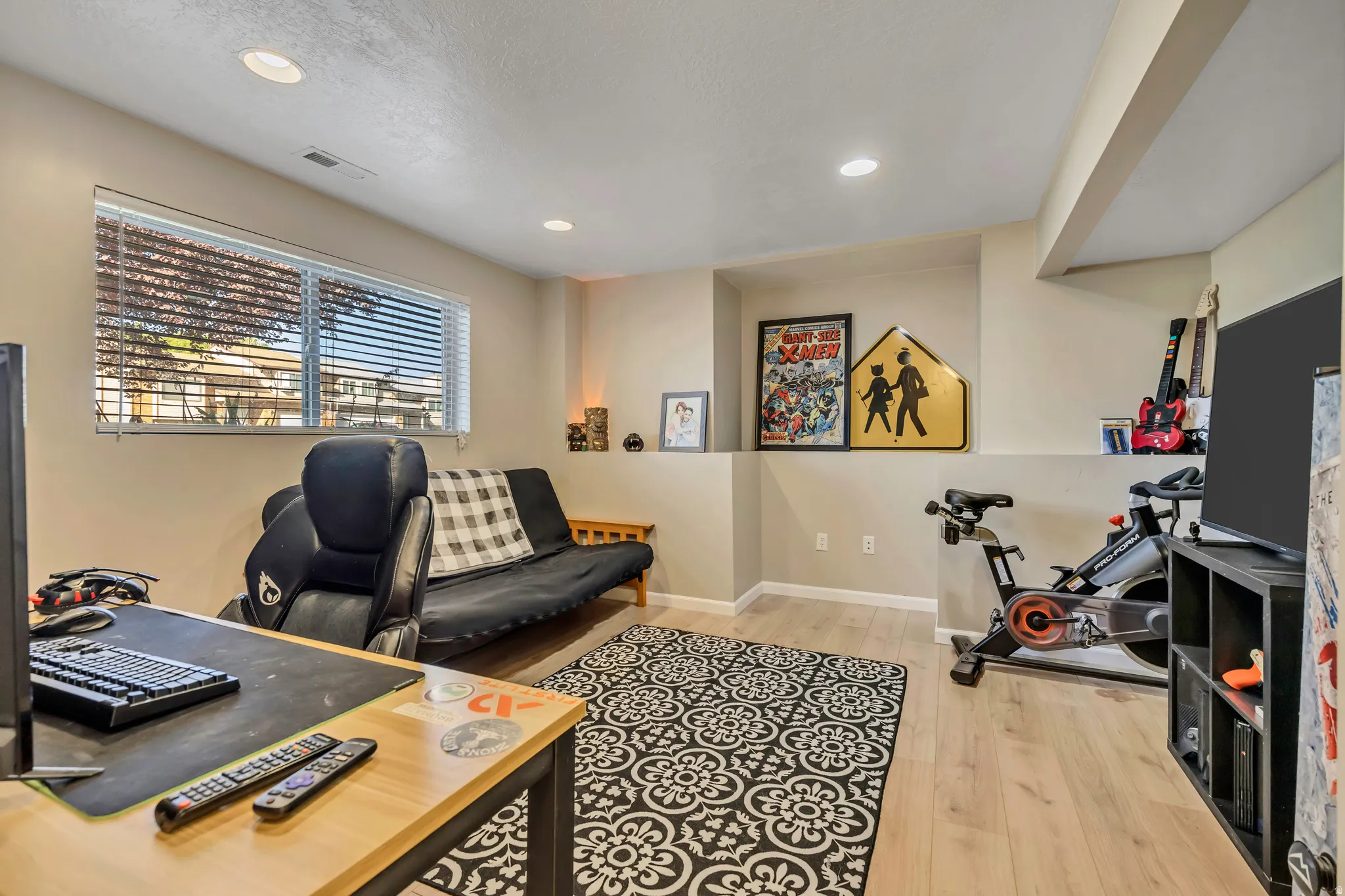 Office featuring light wood-style floors and recessed lighting