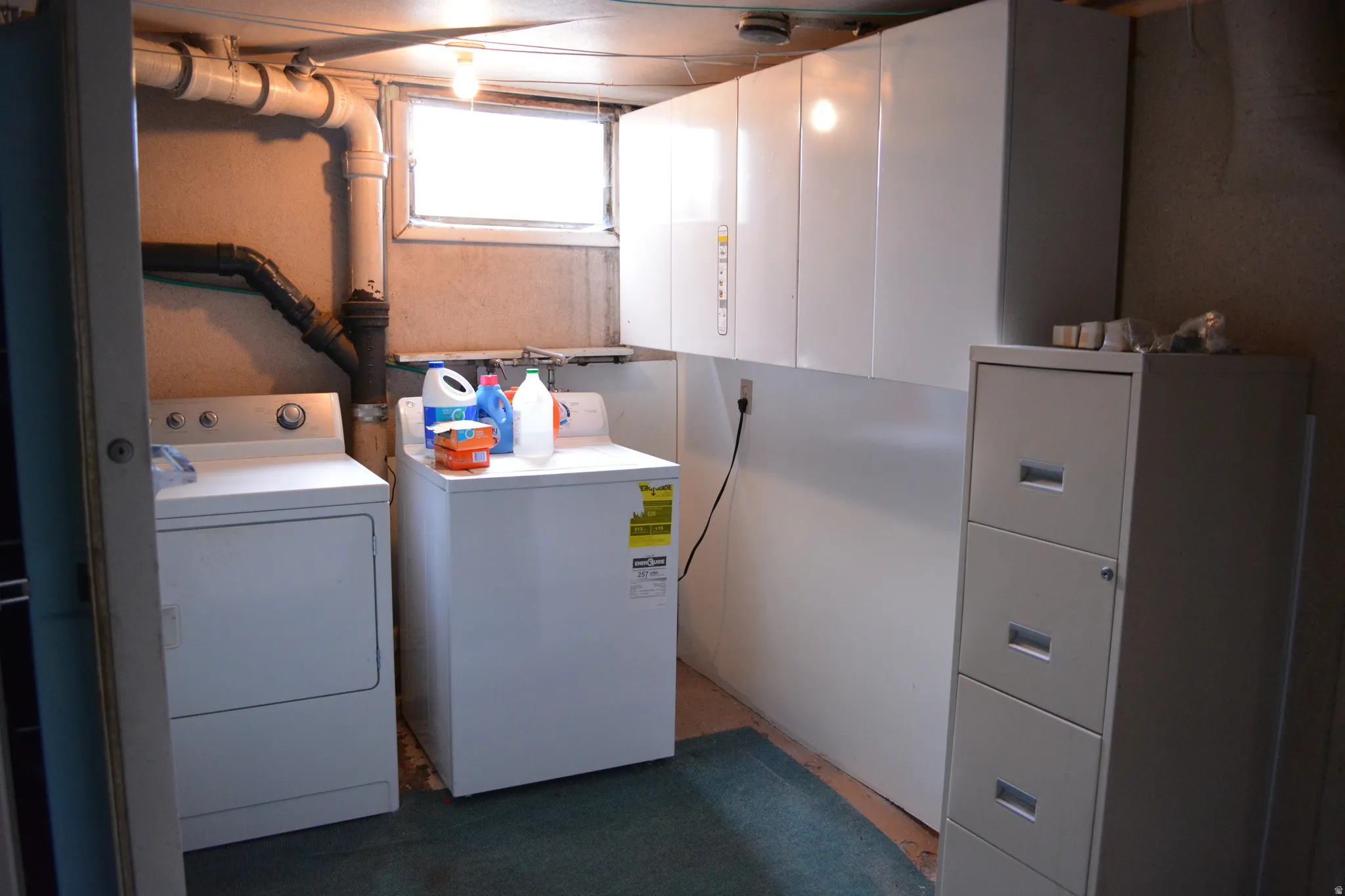 Laundry area with independent washer and dryer