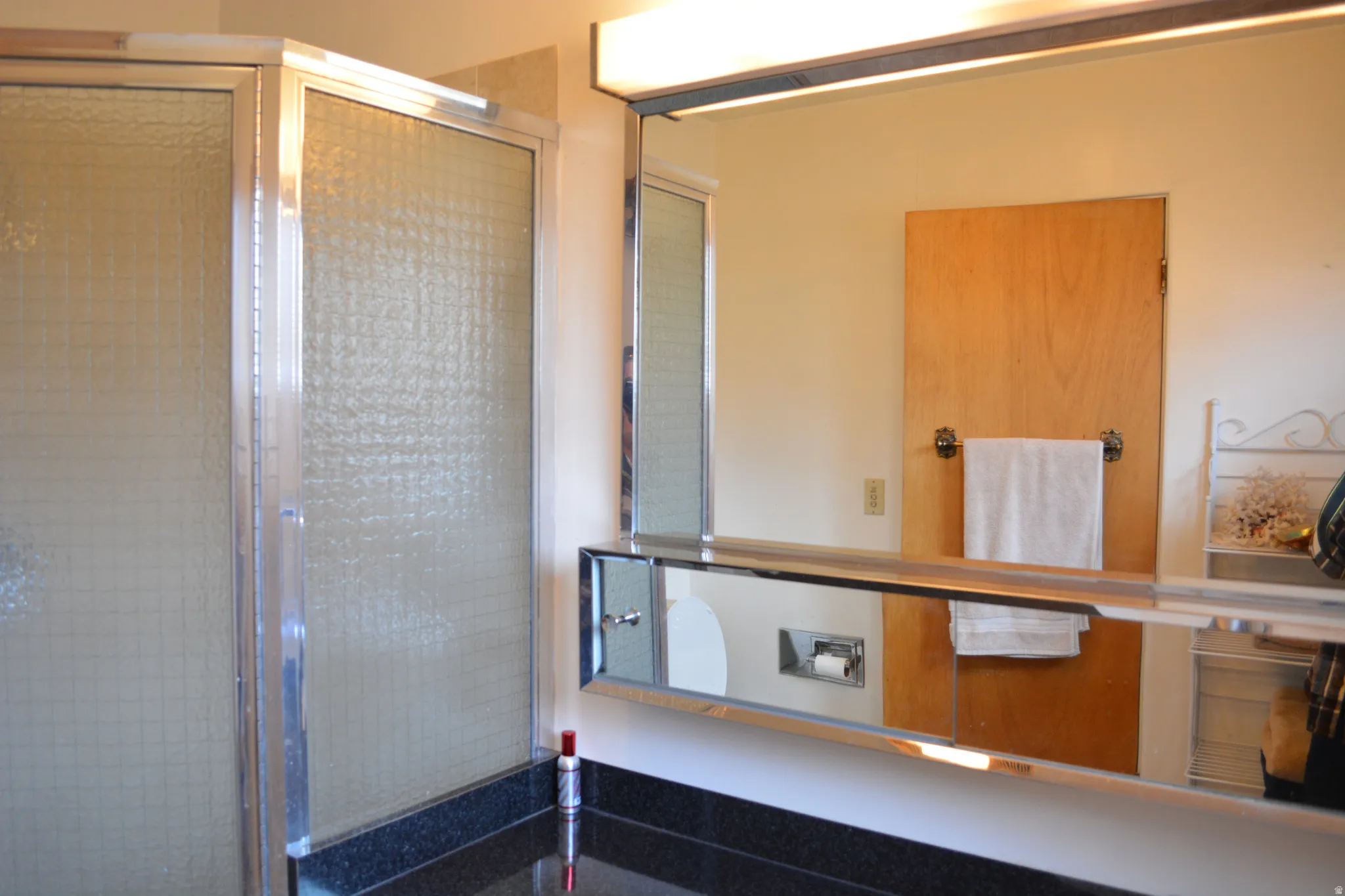 Full bath featuring a stall shower