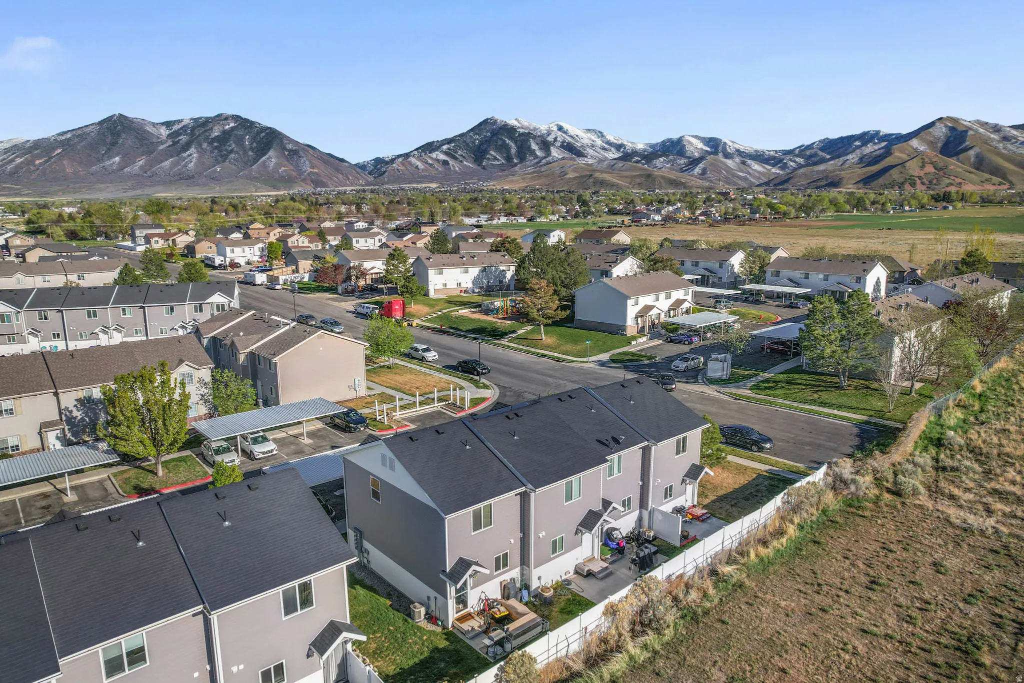 Aerial perspective of suburban area featuring mountains