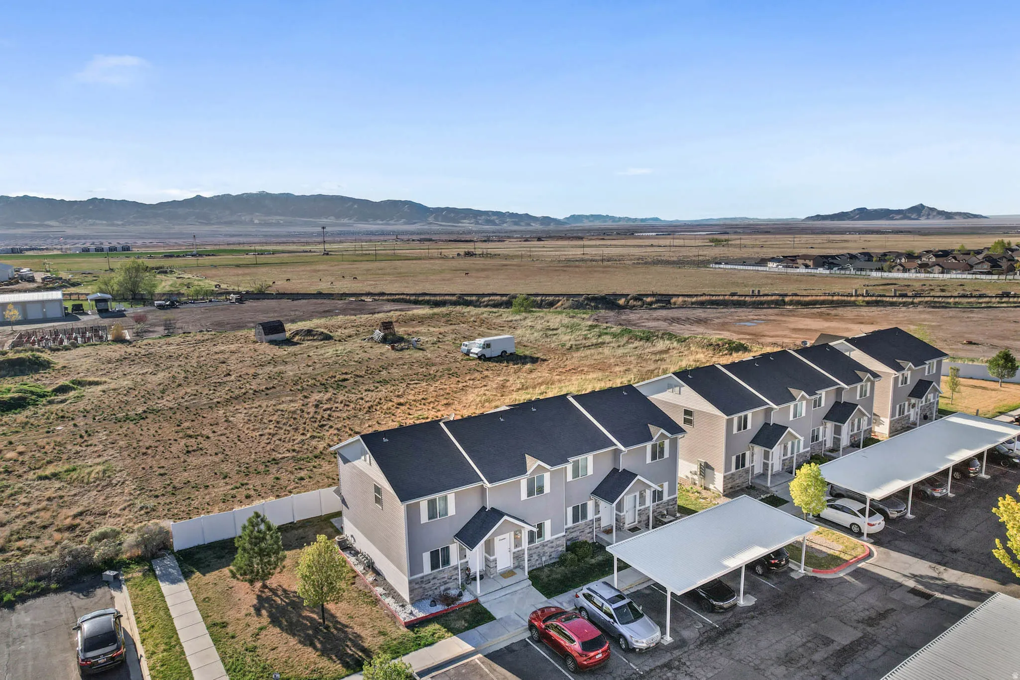 Aerial view of sparsely populated area with mountains