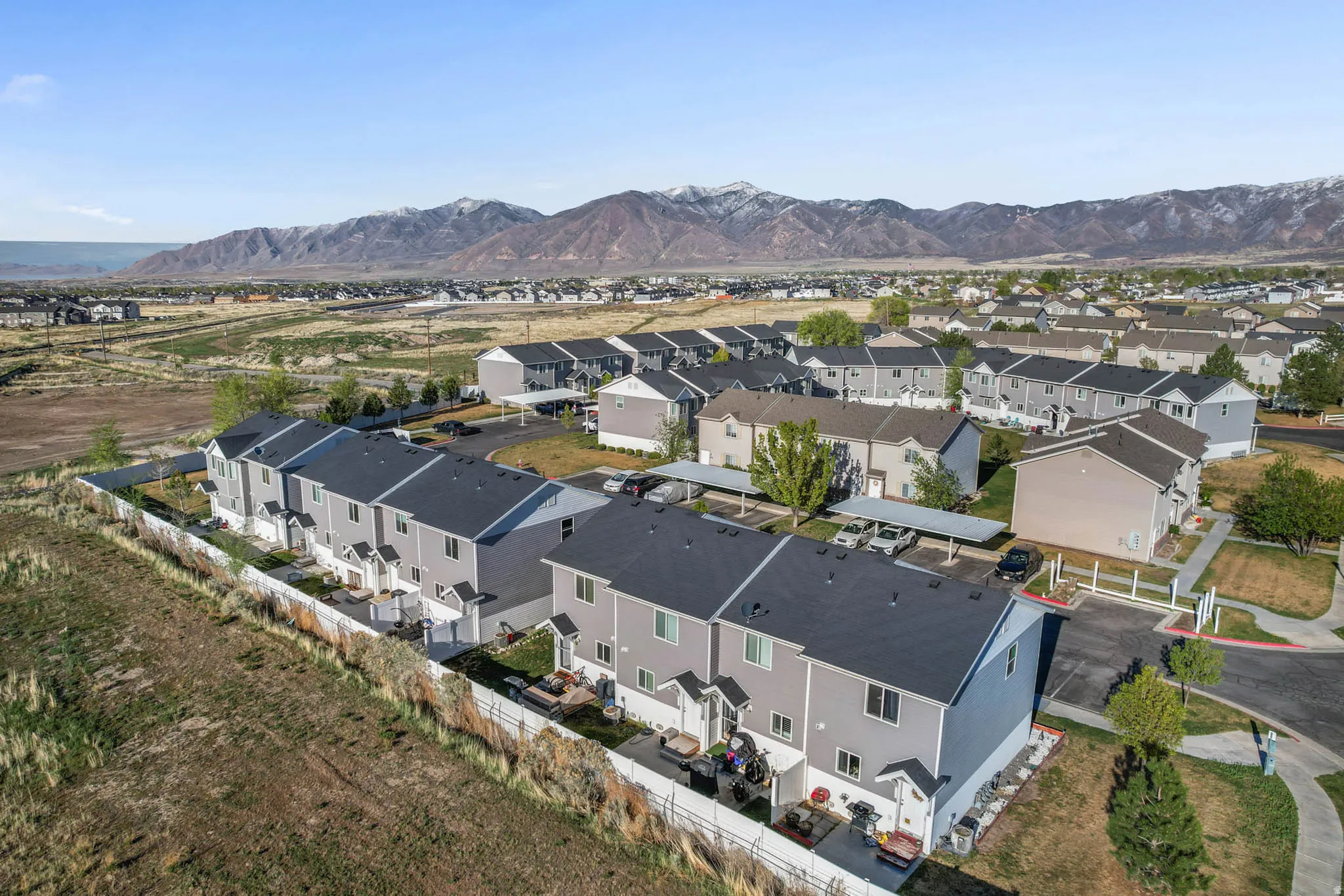 Aerial view of residential area with a mountain backdrop