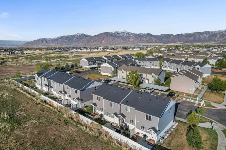 Aerial view of residential area with a mountain backdrop