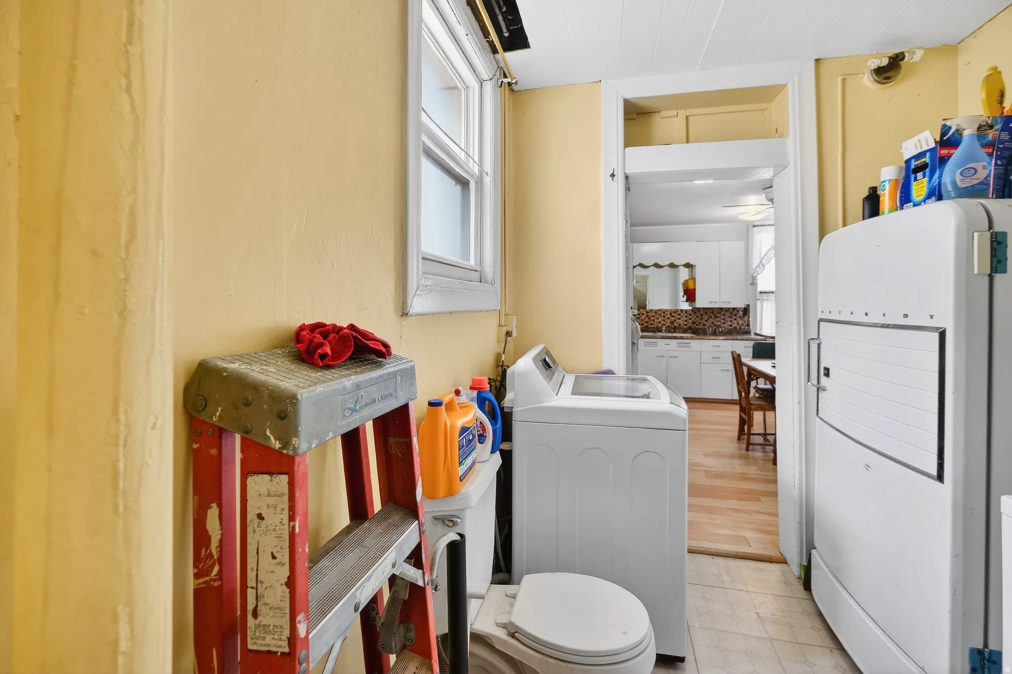 Bathroom with plenty of natural light and washer and dryer