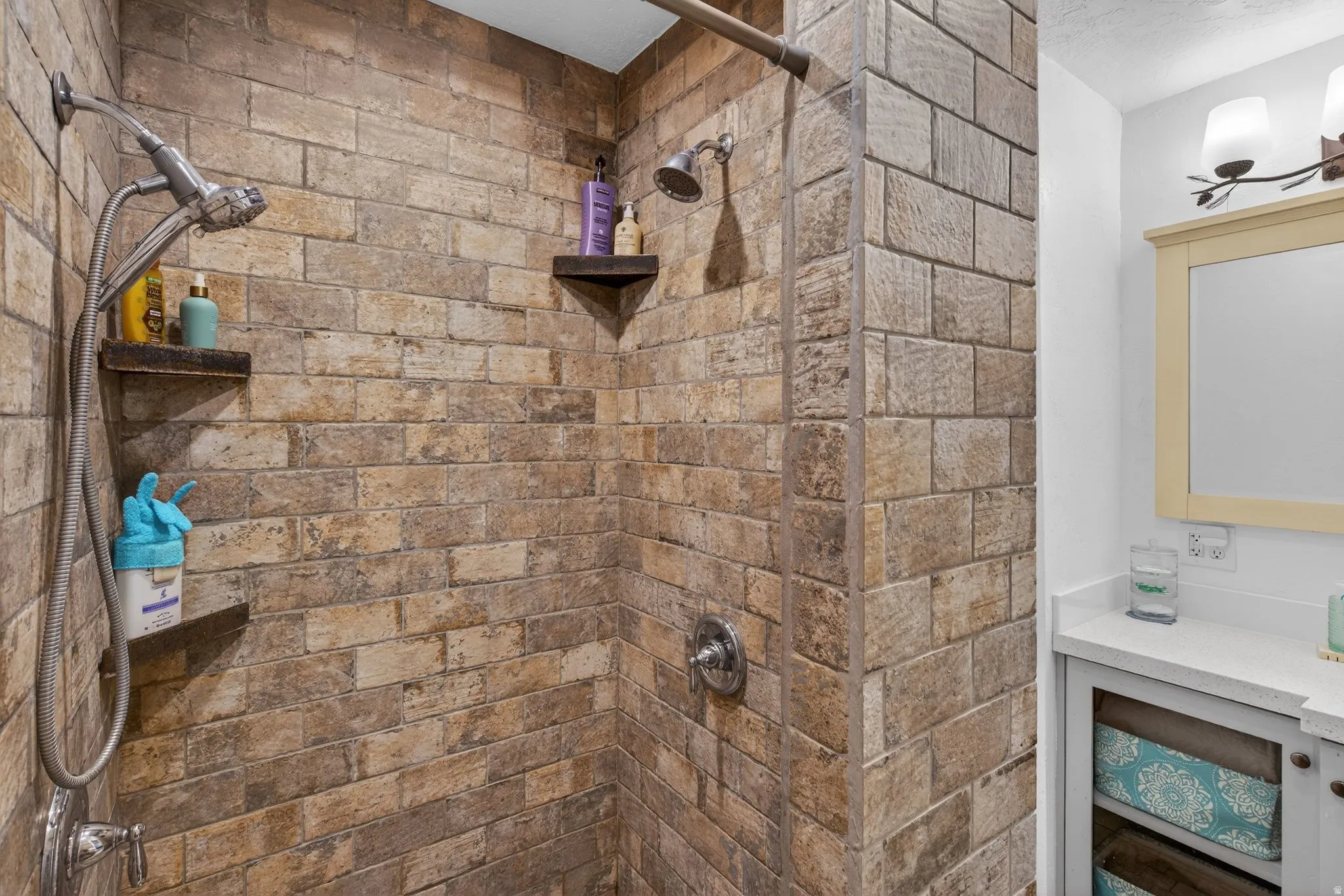 Bathroom featuring tiled shower