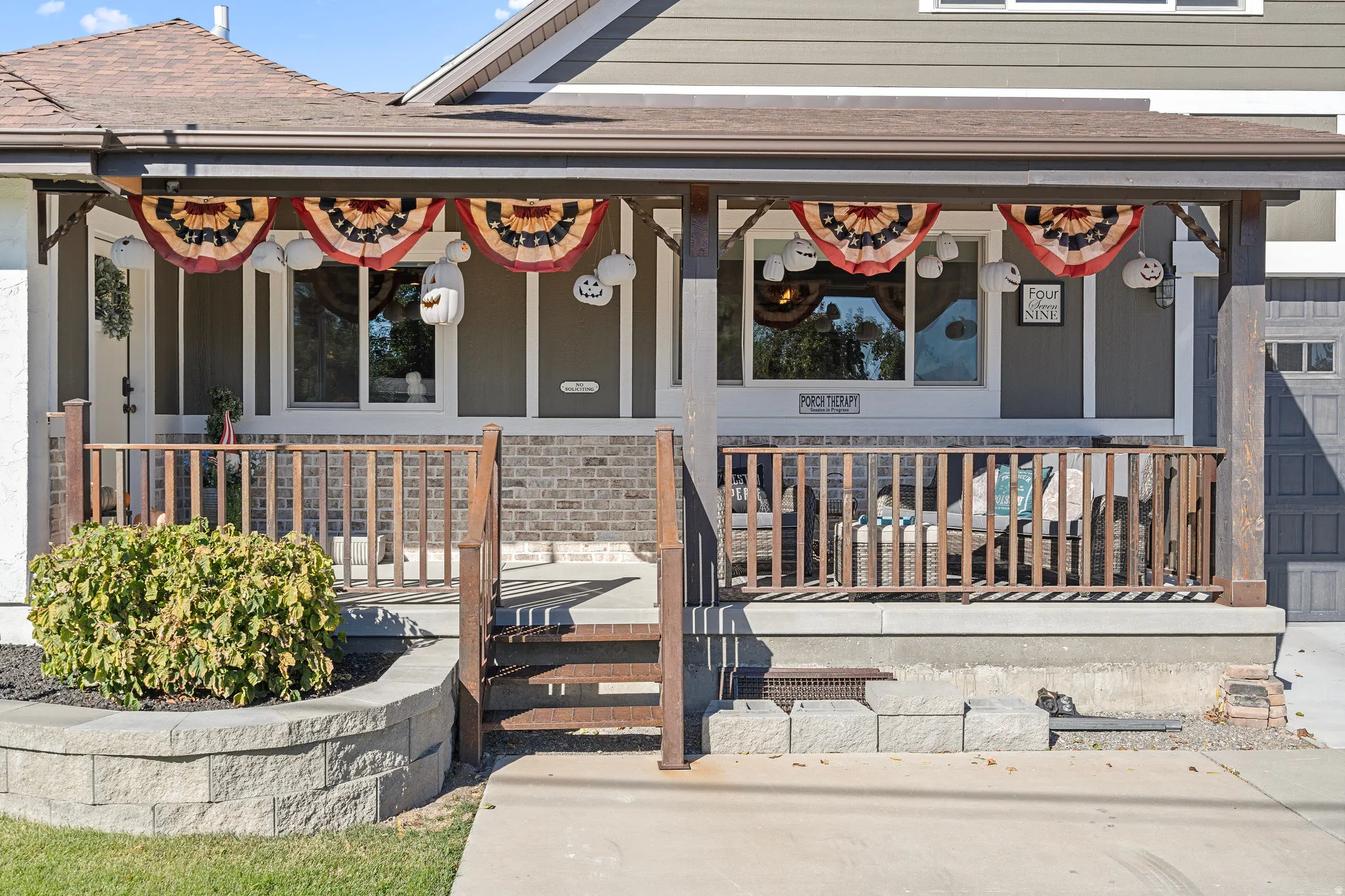 Doorway to property featuring a porch