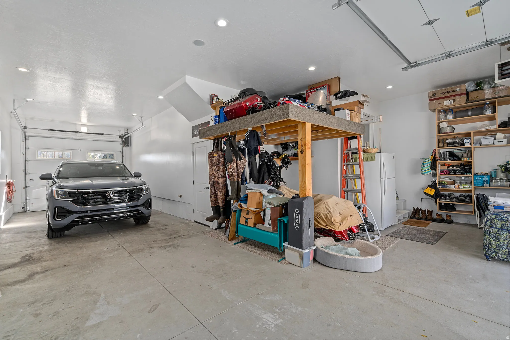 Garage with a heating unit and recessed lighting