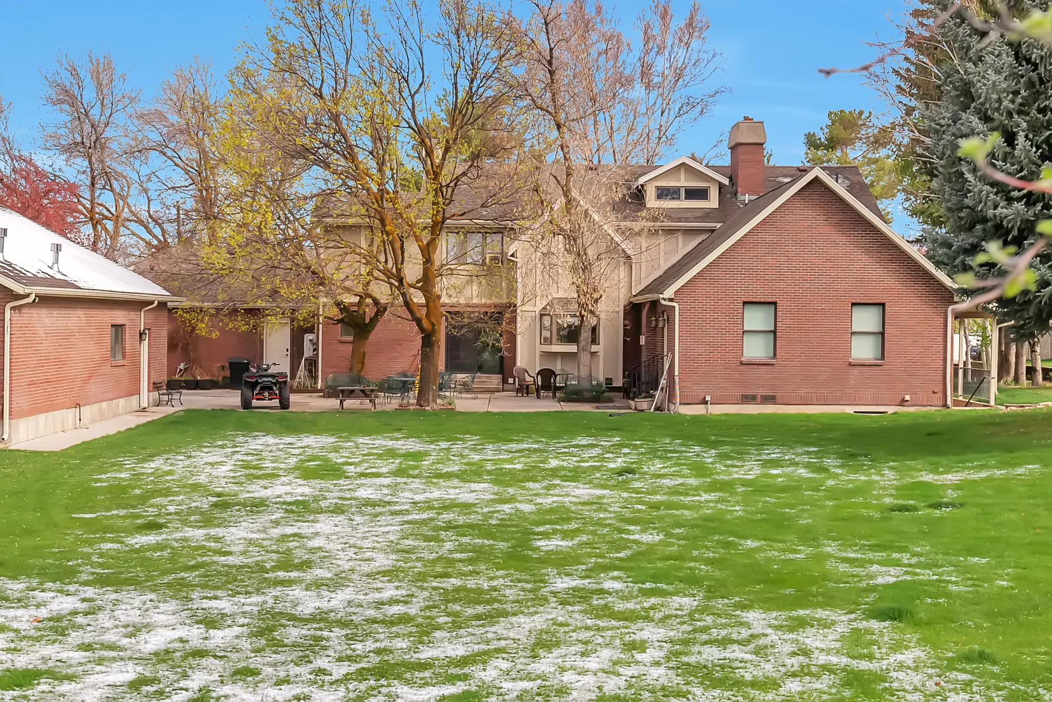 View of back side of home showing new brick.