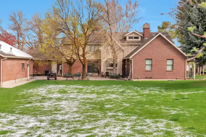 View of back side of home showing new brick.