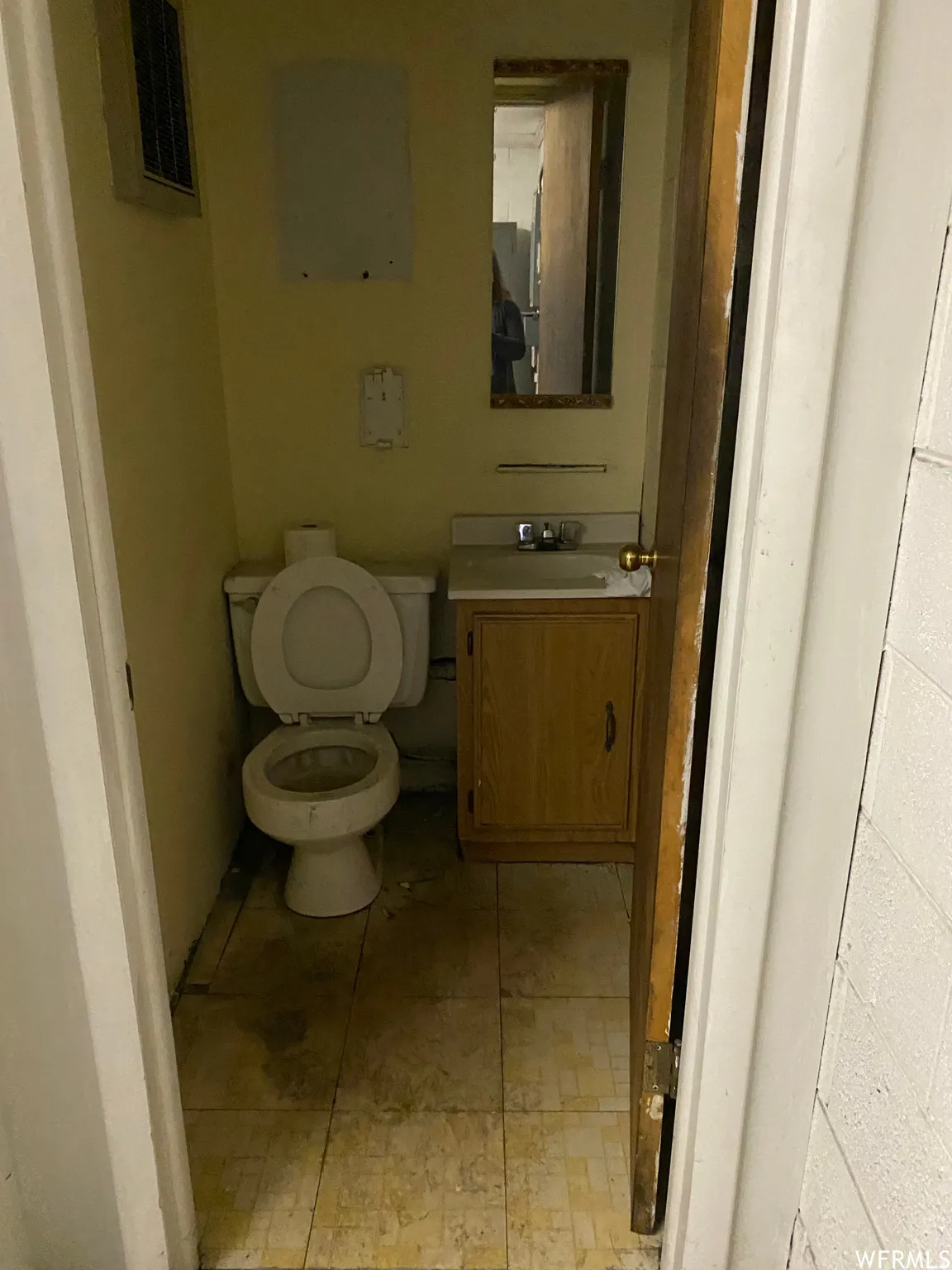 Bathroom with vanity and toilet