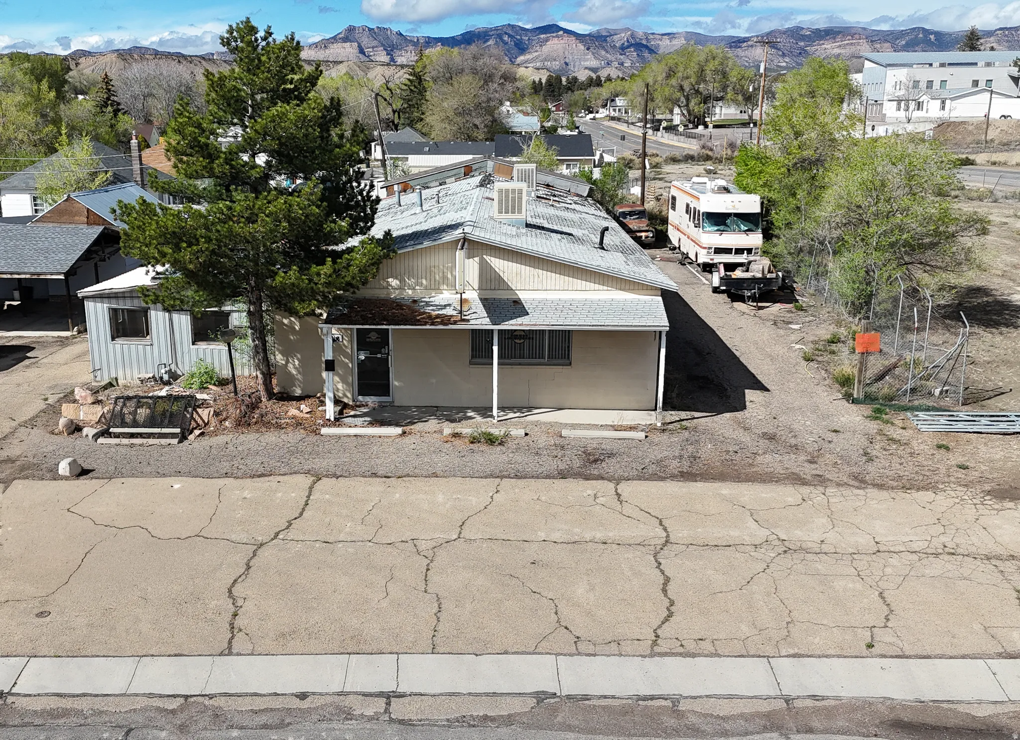 View of front of house with a mountain view and a residential view