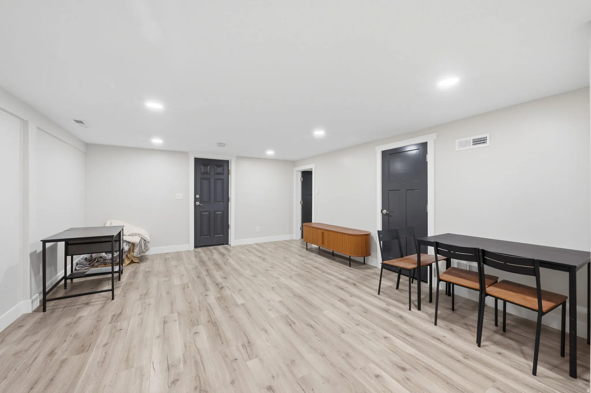 Sitting room featuring recessed lighting and light wood-style floors