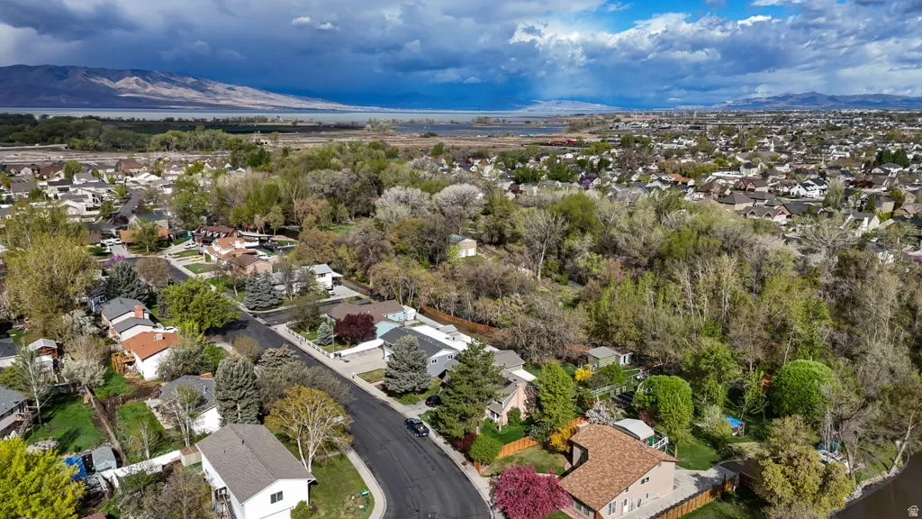 Aerial view of residential area featuring mountains