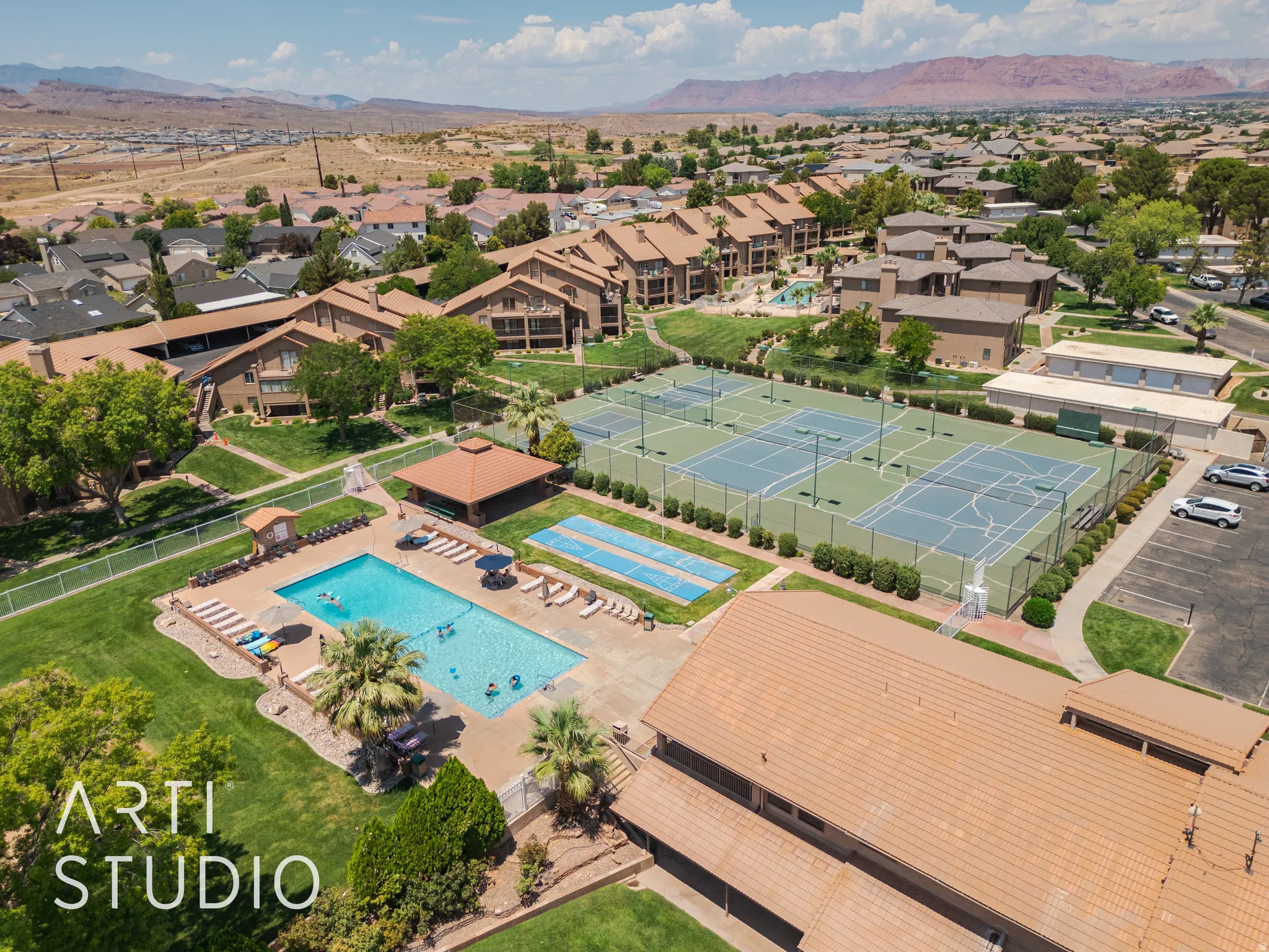 Aerial view of residential area with a mountainous background