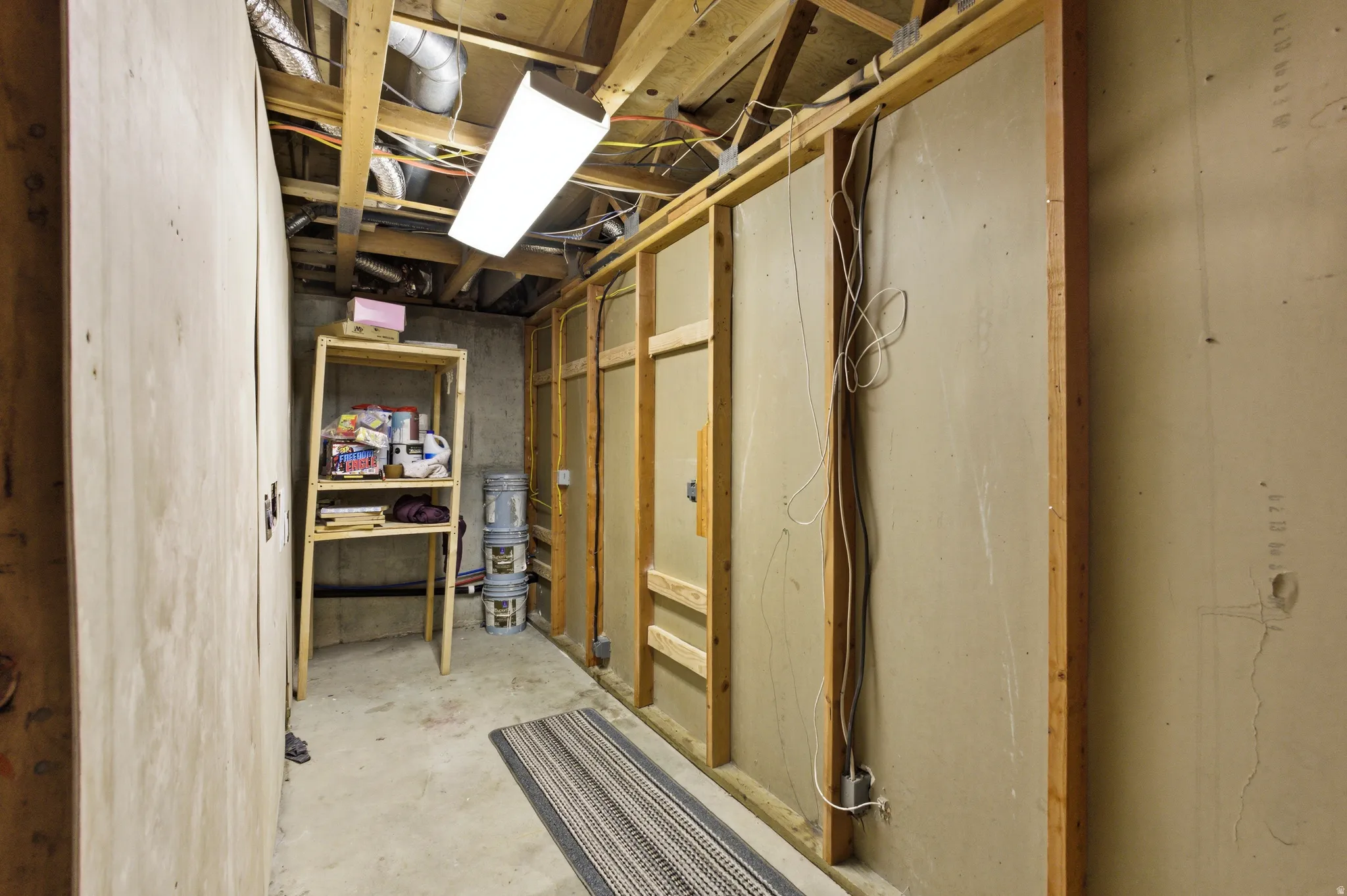 Laundry area basement apartment