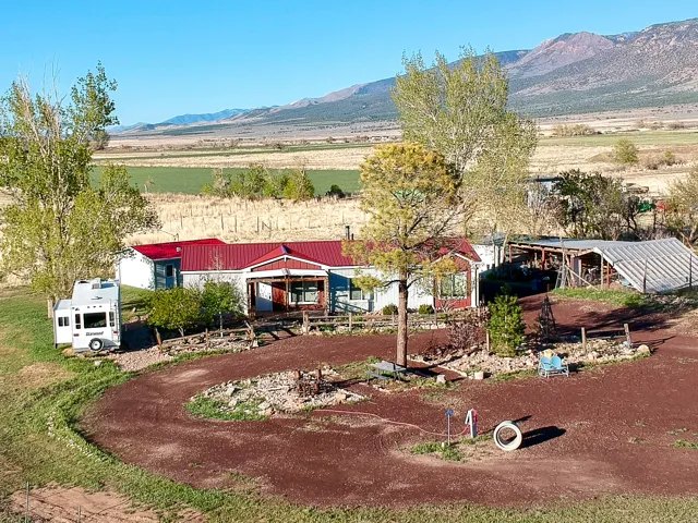 View of front of house featuring a mountain view and a view of countryside
