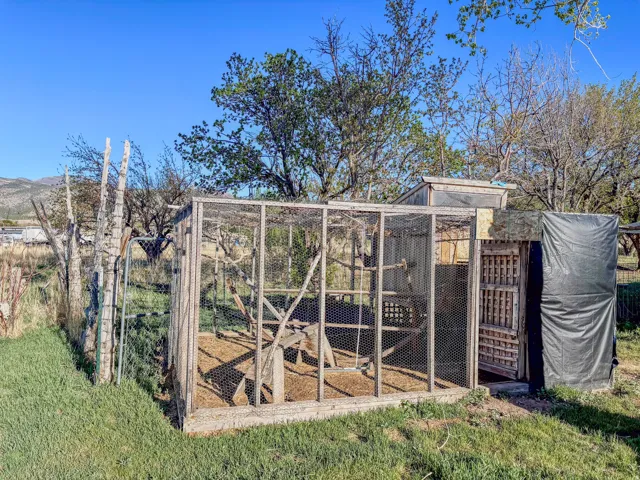Gate featuring an outbuilding and exterior structure