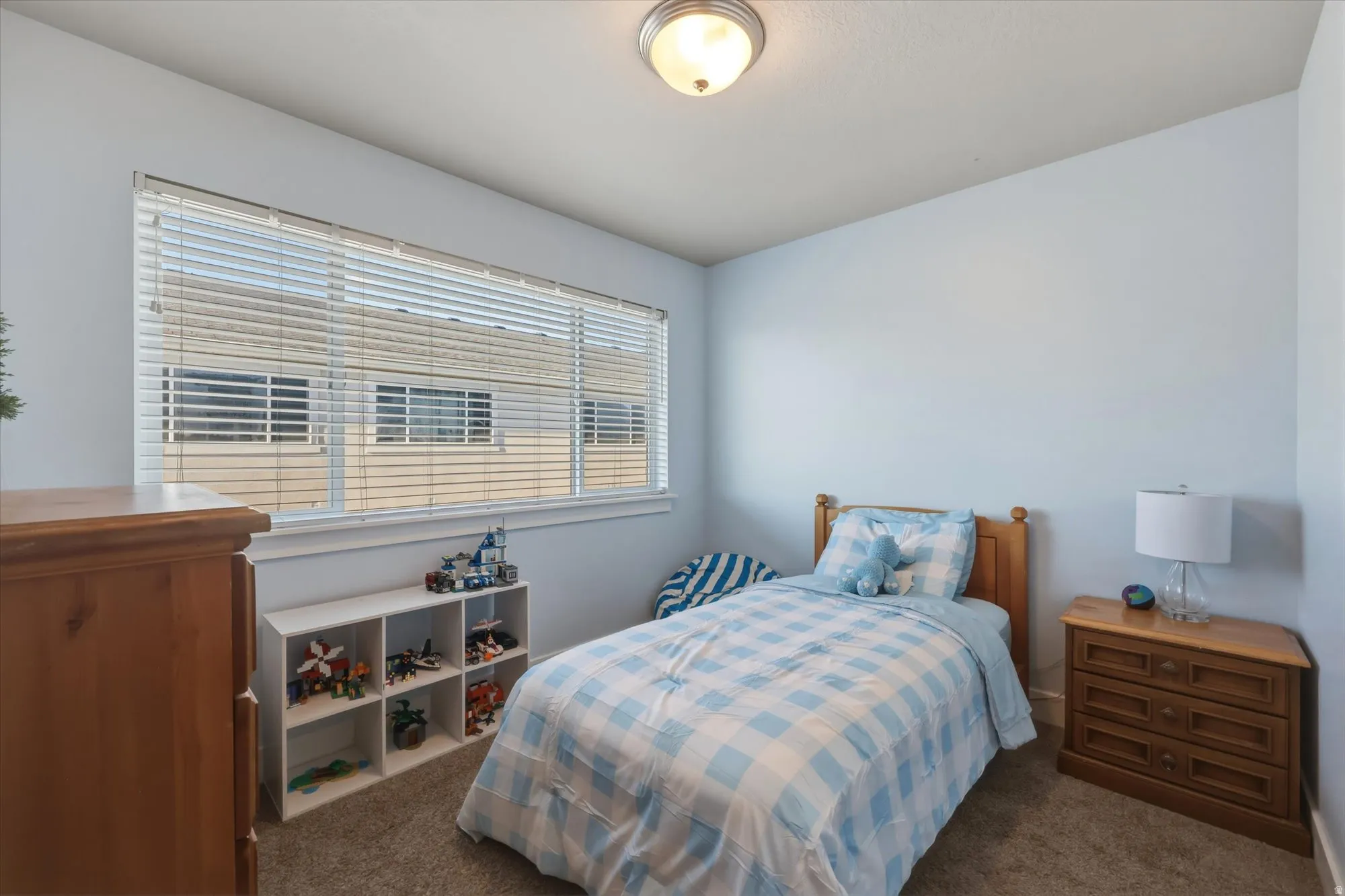 Bedroom featuring carpet flooring