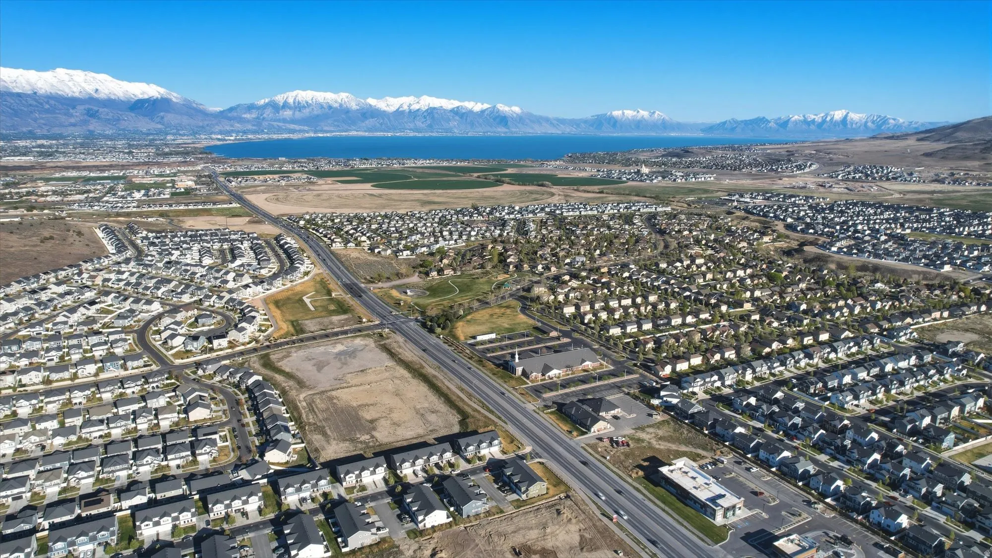 Aerial overview of property's location with a mountainous background