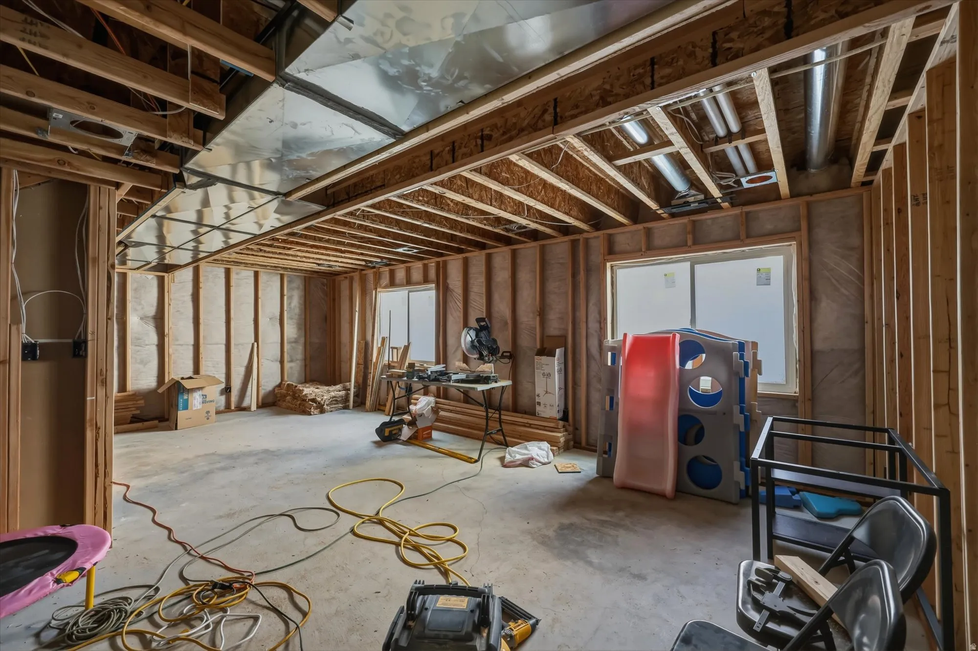 Misc room with concrete floors