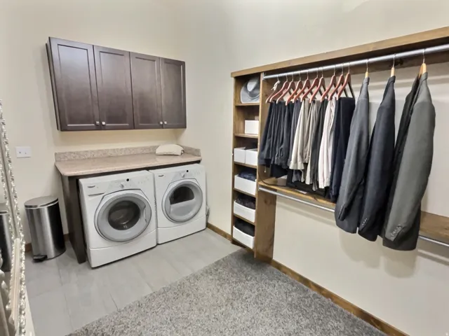 Main level master closet with laundry