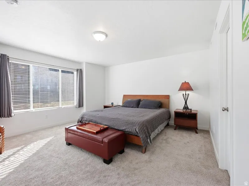 Large primary bedroom with en-suite bath and large walk-in closet