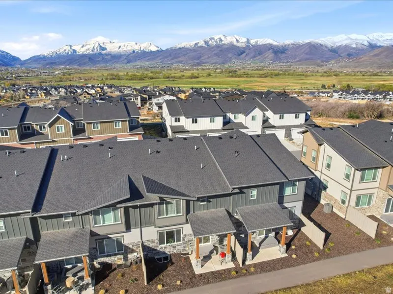Aerial view of residential area with a mountainous background