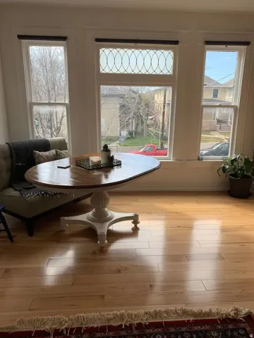 Dining room with hardwood / wood-style floors