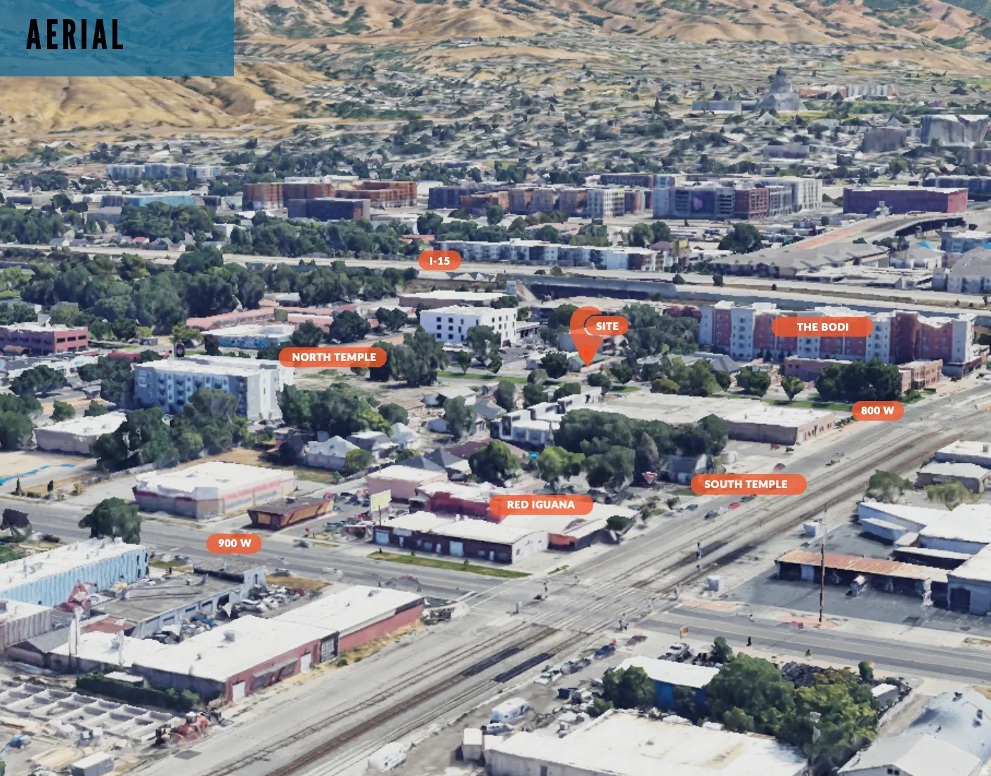 View of property location featuring nearby urban area and a mountain backdrop