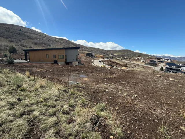View of property exterior with a mountain view