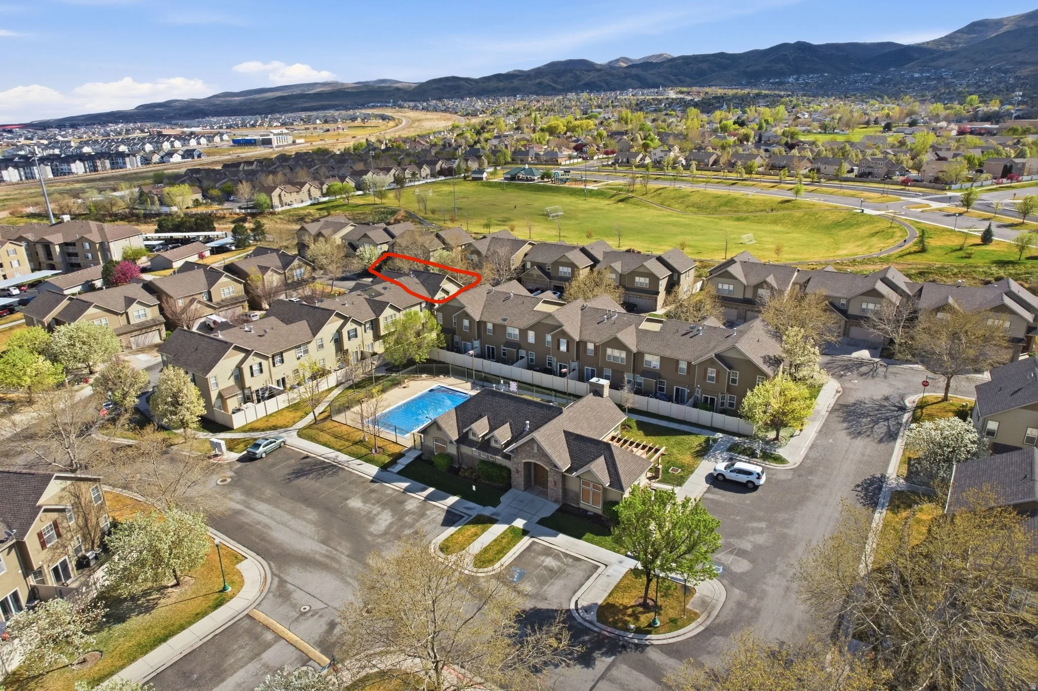 Aerial overview of property's location with nearby suburban area