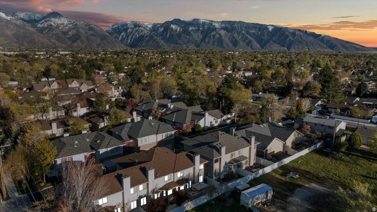 Aerial view of residential area with a mountain backdrop