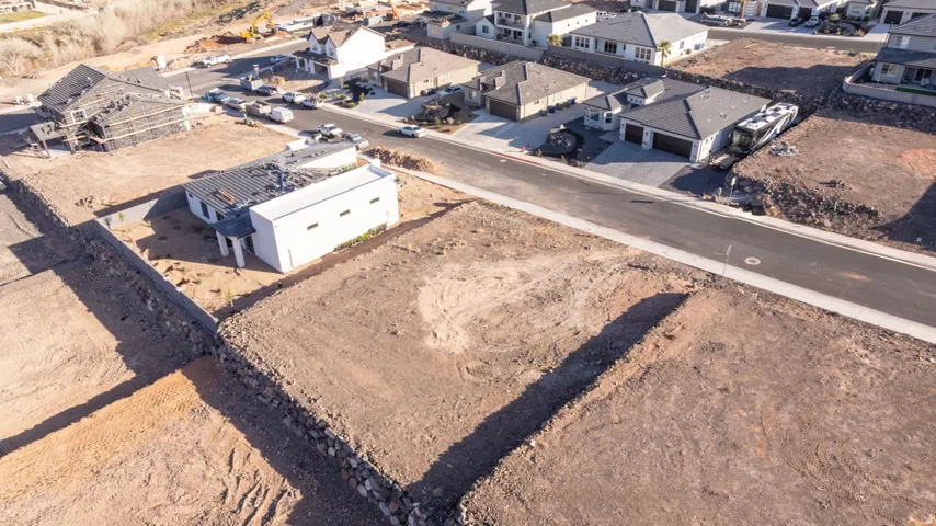 Aerial overview of property's location featuring nearby suburban area