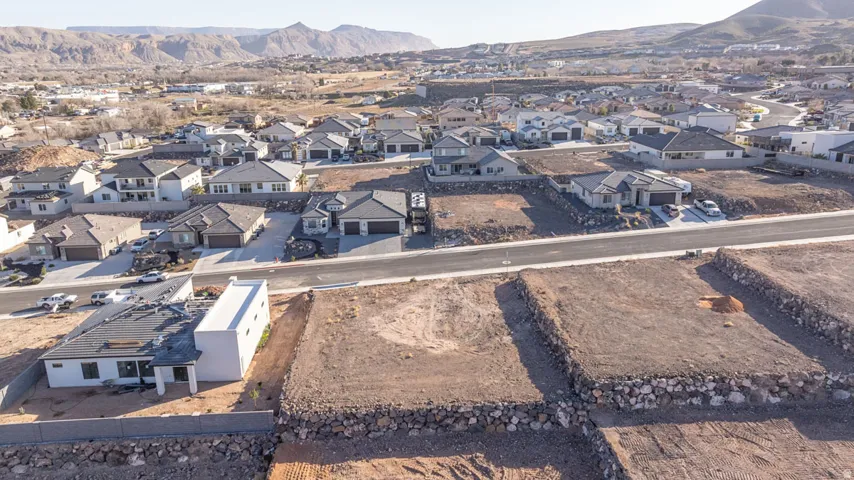 Aerial perspective of suburban area with mountains
